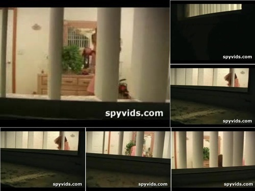 Exhibitionism NakedPizzaDelivery WINDOW SPY Girl filmed at night getting dressed after she came out of the shower FAKE image