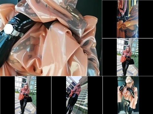 Animal Impersonation Transparent Pink Latex Hijab Style in Public image