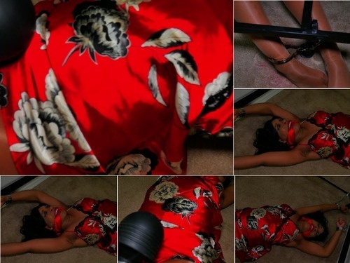 Beastiality Fantasy Bound To A Bed Frame In My Silk Nightie image