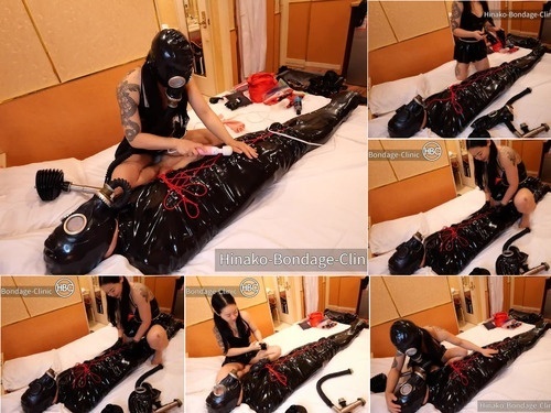 Suspended Latex Obsessed Guy Gets Fucked in the Ass with a Strap-on Part 2 image
