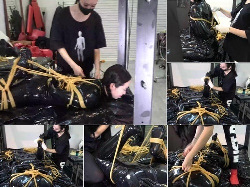 Suspended Hinako in Latex Catsuit Gets Strictly Hogtied with Latex Tubes image