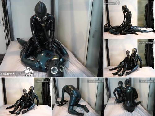 Suspended Latex Lovers have Latex Sex in Head to Toe Latex image