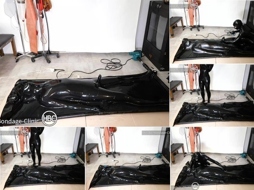 Taped Latex Vacuum Bed With Dick Hole Part 1 image