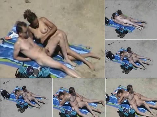 Strangers VoyeursHD com Couple having fun at the beach image