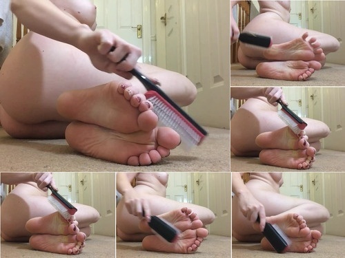 Humiliaion tickling my feet with a hairbrush image