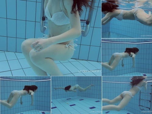 Underwater White swimsuit with tattoos babe Roxalana Cheh underwater image